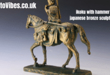 ikoku with hammer japanese bronze sculpture